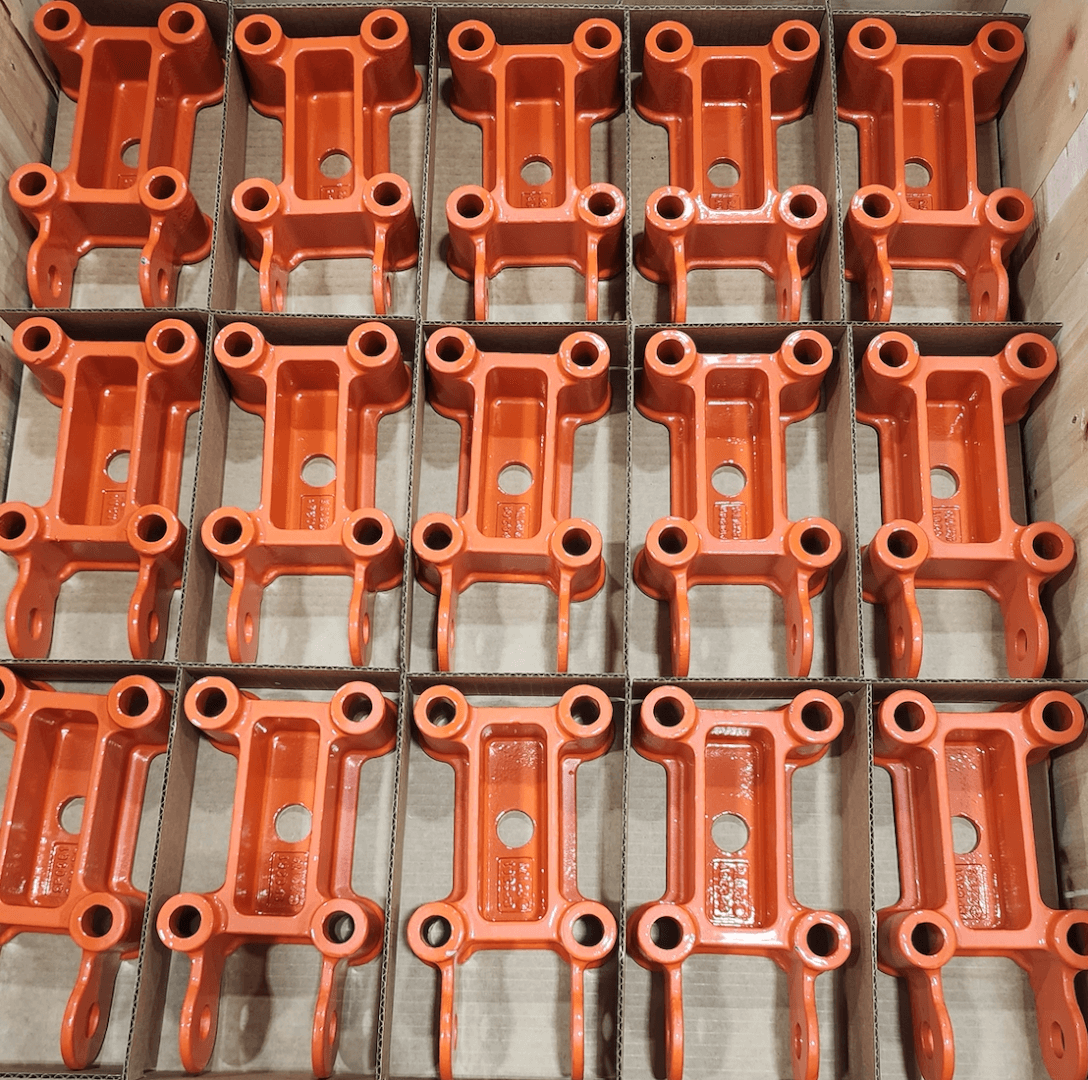 Close-up up orange suspension parts.